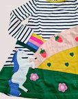 Mini Boden Girls Horse Scene Jersey Dress – Flowers & Rainbow Stripe