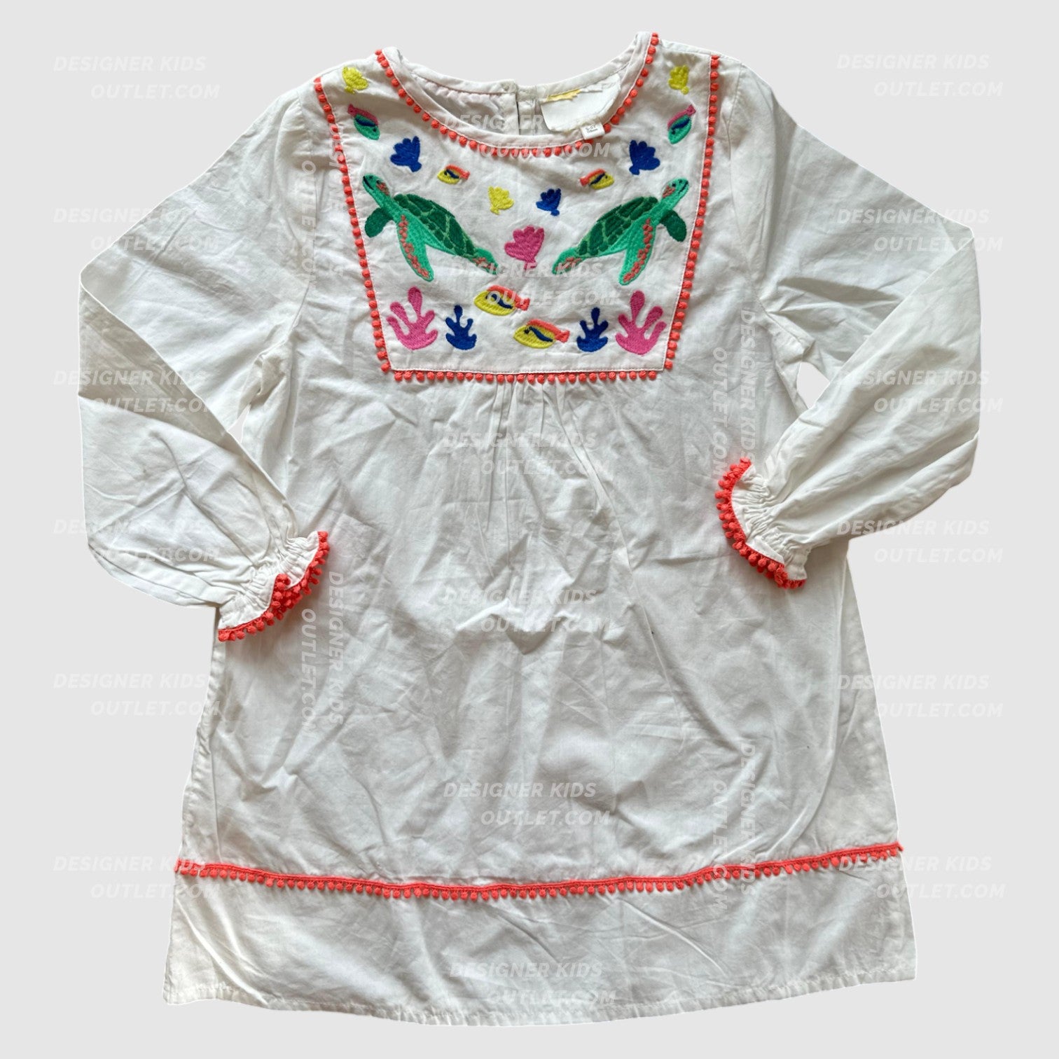 White cotton poplin tunic dress for girls with colorful embroidered sea life details, including turtles, fish, and coral, with a button-front closure and short sleeves.